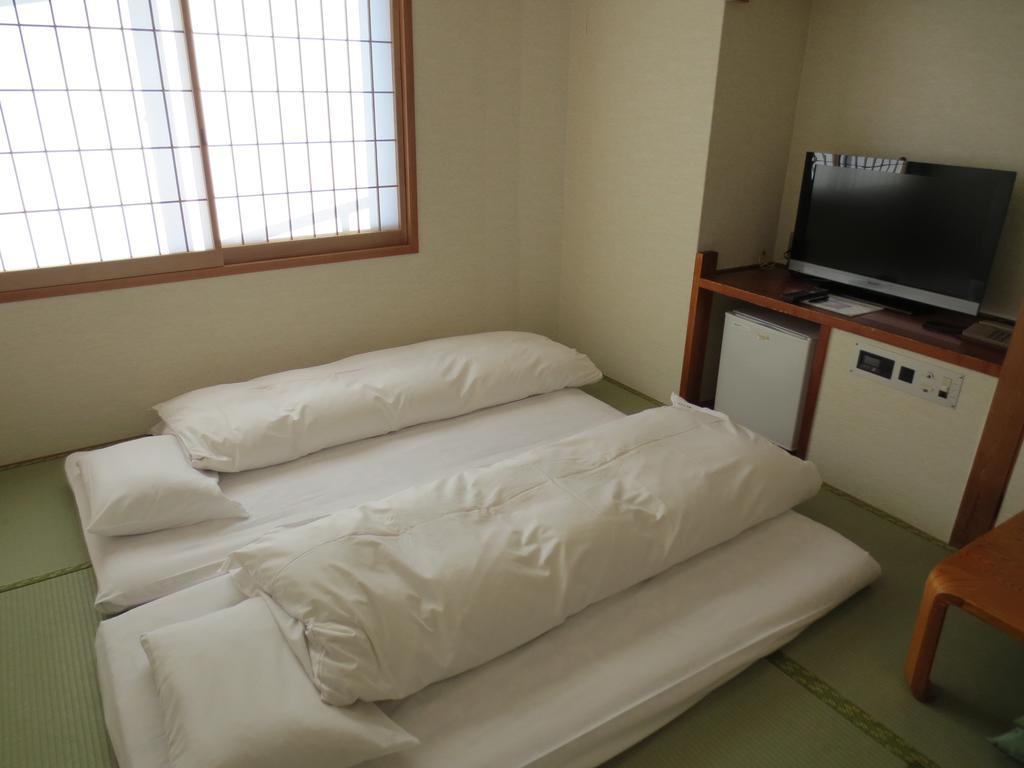 Hotel Minatoya Kōchi Quarto foto